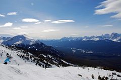 19B Skiing Lake Louise From Top Of The World Chair With Lipalian Mountain, Mount Assiniboine, Storm Mountain, Mount Bell, Panorama Peak, Quadra Mountain, Mount Fry and Tower Of Babel.jpg